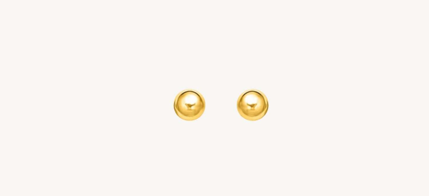 Classic 10K yellow gold stud earrings featuring a polished ball design for timeless elegance.