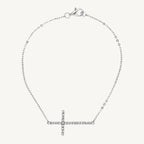 Elegant 7-inch bracelet featuring a classic cross design with sparkling cubic zirconia stones and a lobster clasp closure.