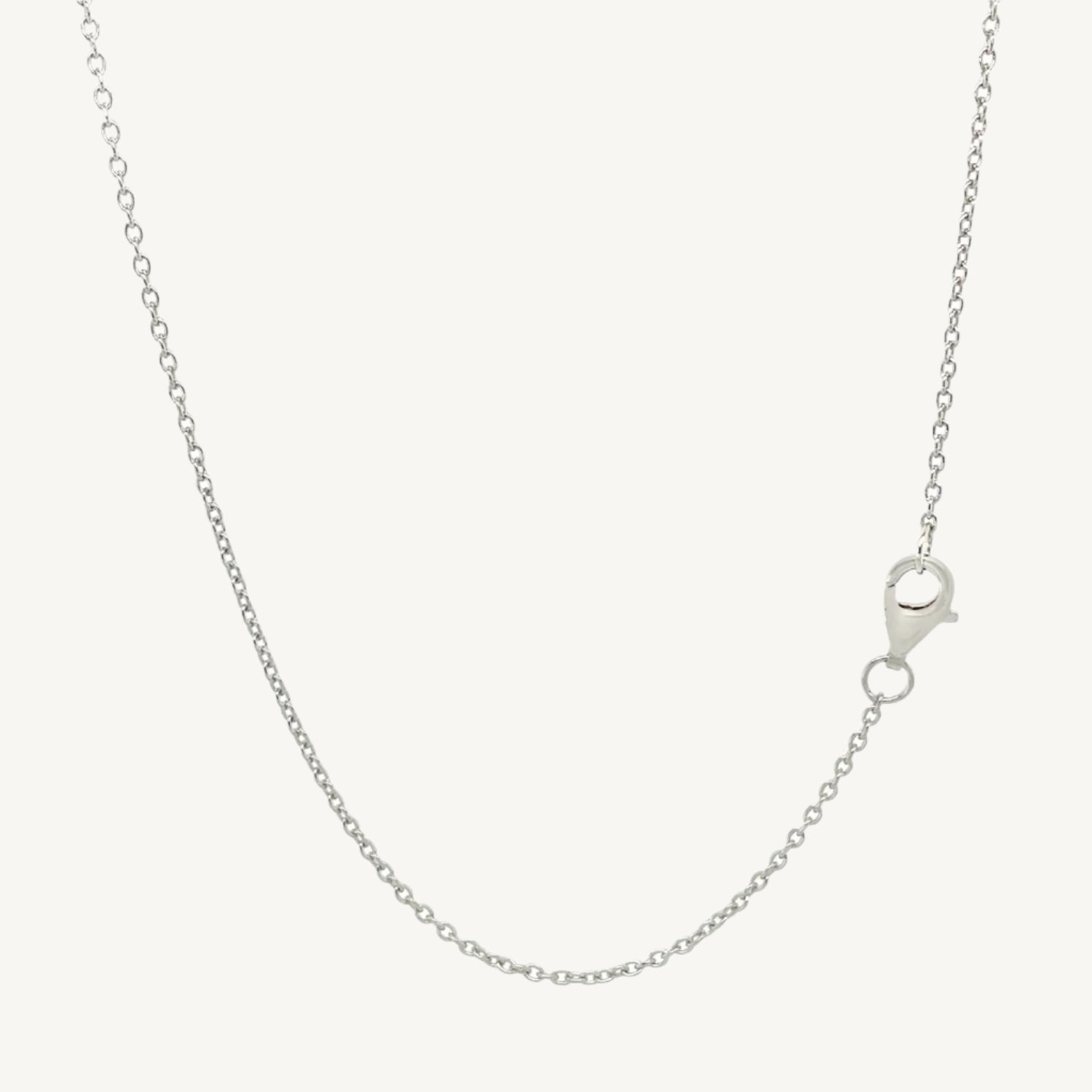 Elegant 7-inch bracelet featuring a classic cross design with sparkling cubic zirconia stones and a lobster clasp closure.