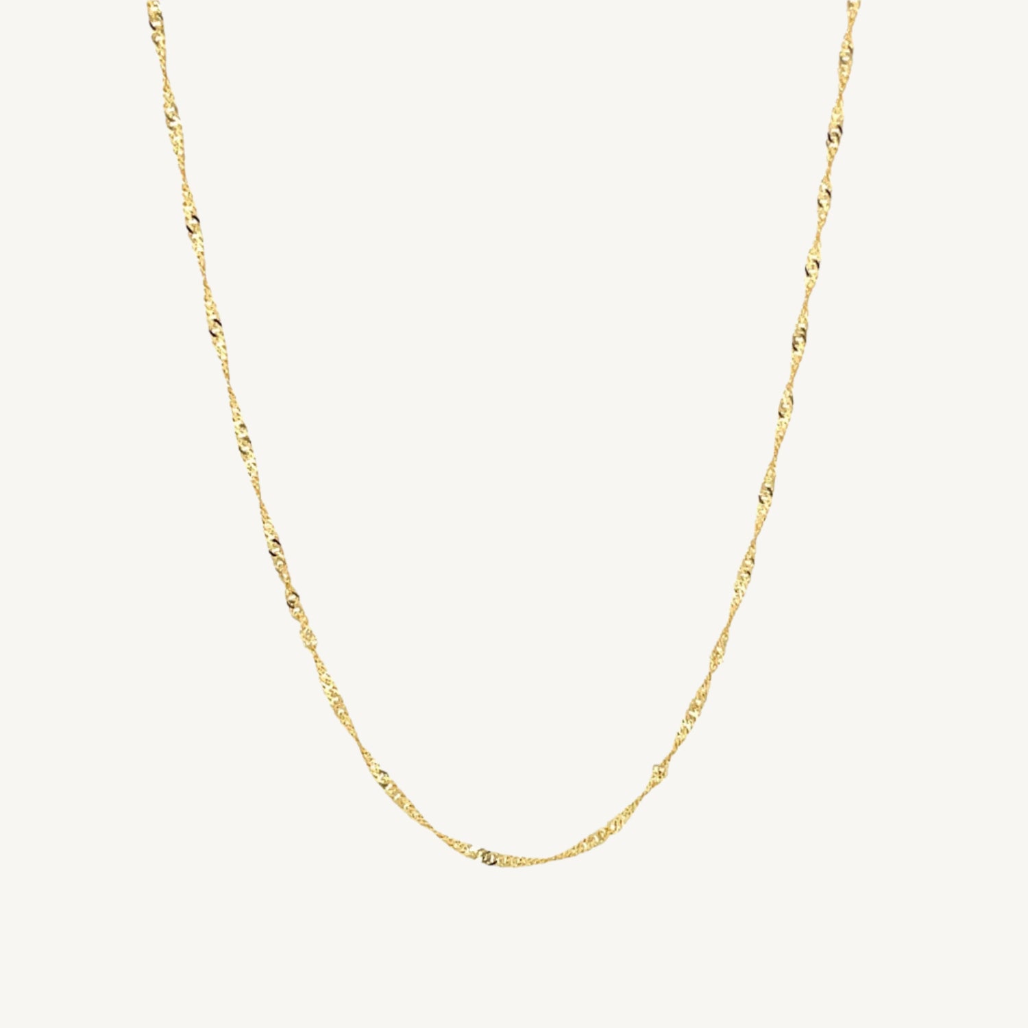 "Elegant 10k yellow gold Singapore chain, 1.50 mm wide, with a delicate twisted design and polished finish."