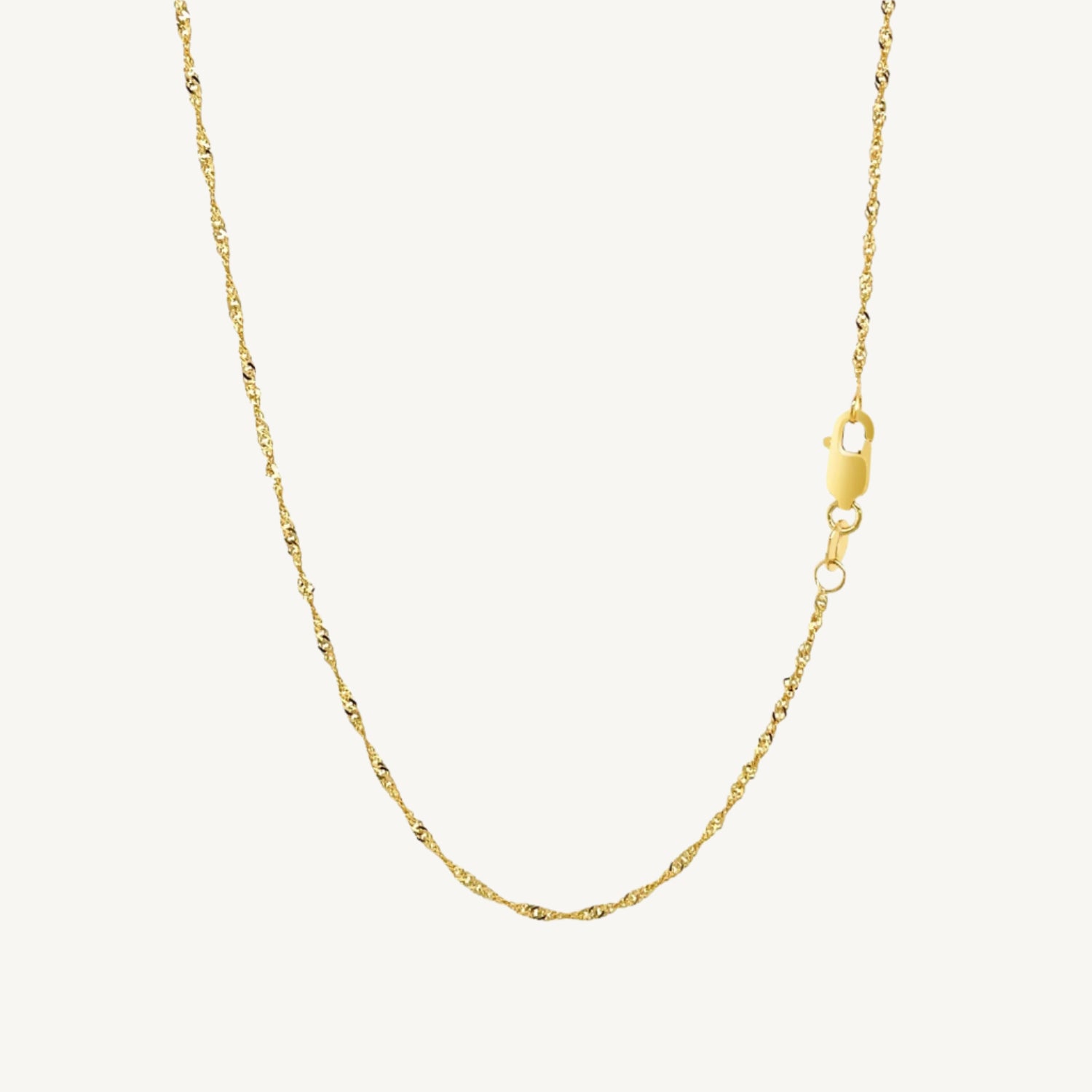 "Elegant 10k yellow gold Singapore chain, 1.50 mm wide, with a delicate twisted design and polished finish."