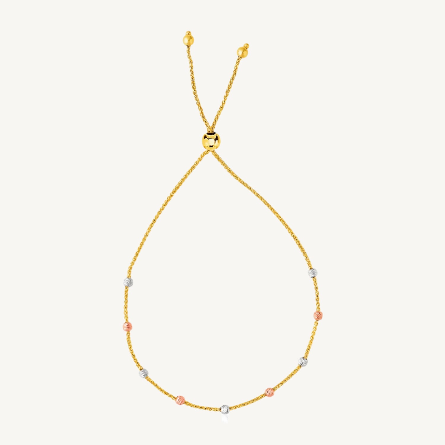 14k tri-color gold lariat bracelet with 5.00 mm textured bead stations in yellow, white, and rose gold.