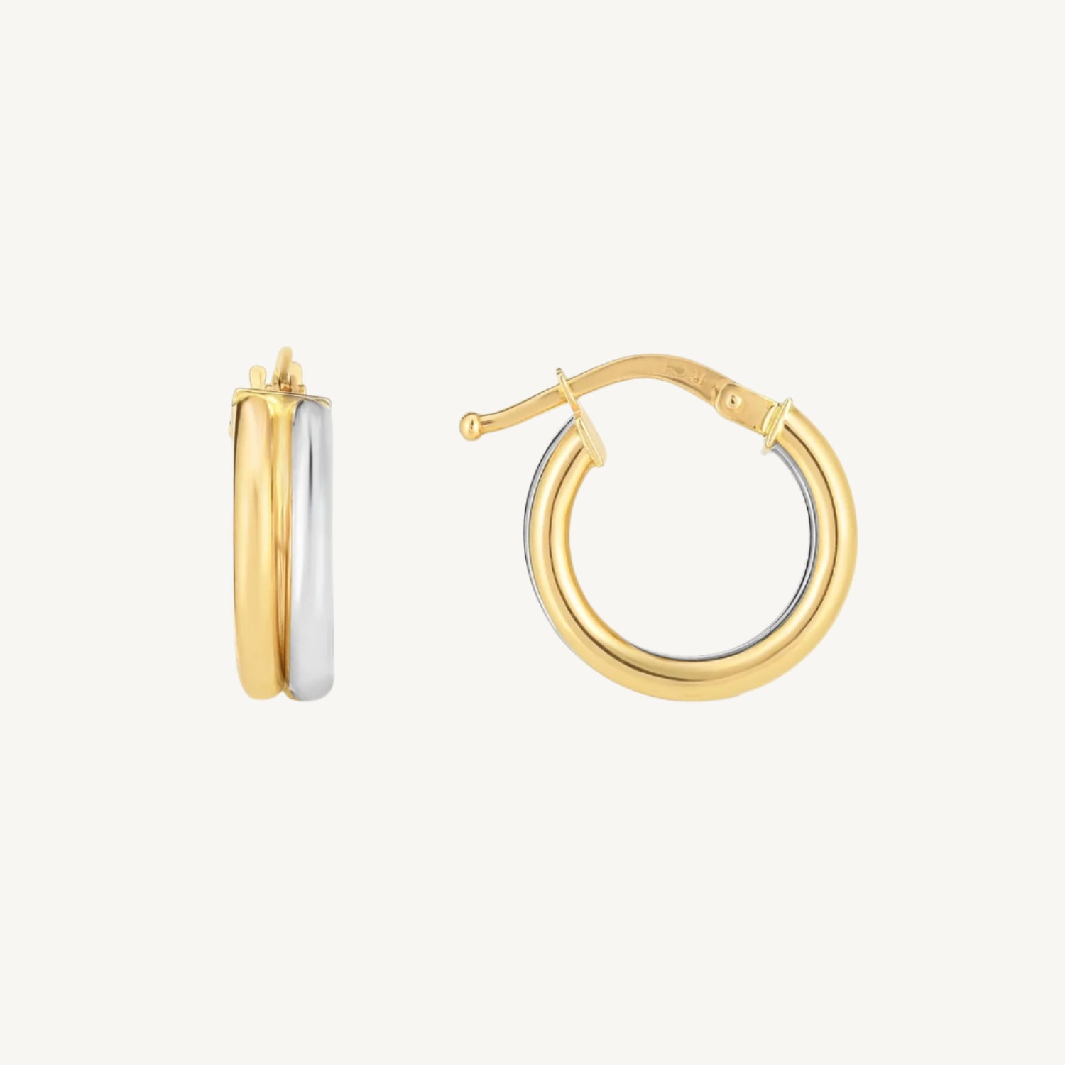 14k two-tone gold double round hoop earrings in yellow and white gold.