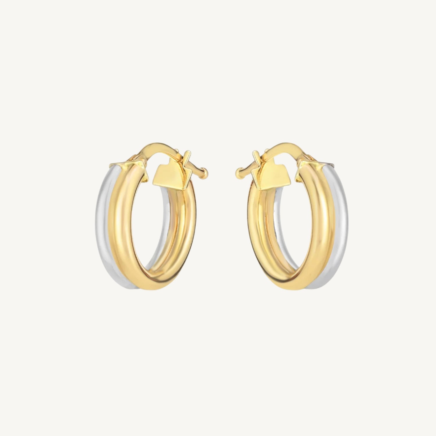 14k two-tone gold double round hoop earrings in yellow and white gold.
