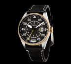 Watch with black dial and leather strap on a white background