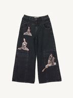 "Wide-leg denim jeans with hand-painted portraits of women as main subjects. Each pair is unique, turning the wearer into part of a living artwork."