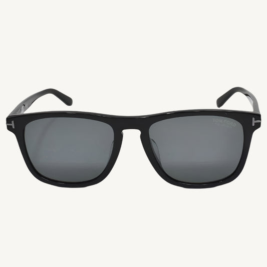 "Tom Ford unisex black sunglasses, model FT0930-F-01D-56, featuring square acetate frame with polarized lenses and signature luxury finish"