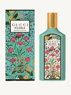 "Gucci Flora Gorgeous Jasmine Eau de Parfum 3.3 oz – luxurious turquoise bottle with floral details, evoking elegance and fresh jasmine blooms."