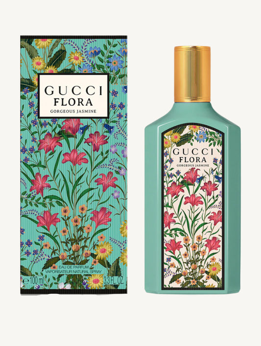 "Gucci Flora Gorgeous Jasmine Eau de Parfum 3.3 oz – luxurious turquoise bottle with floral details, evoking elegance and fresh jasmine blooms."