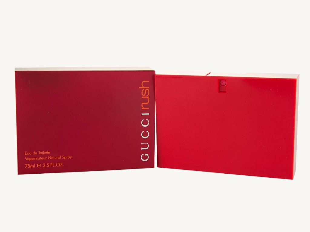 "Gucci Rush 2.5 oz Eau de Toilette Spray for Women – bold red rectangular bottle with minimalist design, reflecting the vibrant and sensual fragrance within."