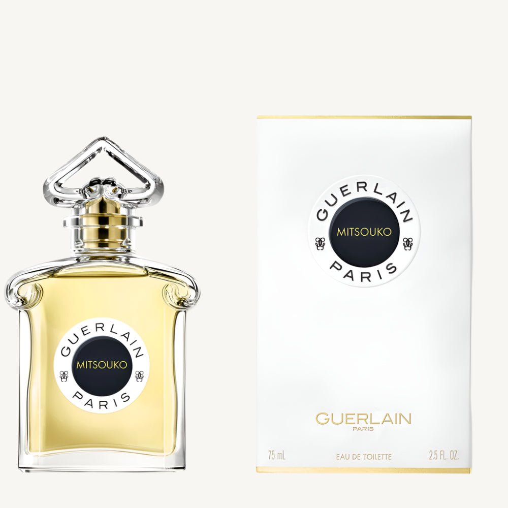 "Guerlain Mitsouko 2.5 oz Eau de Toilette Spray for Women – elegant glass bottle with golden-hued fragrance and classic Guerlain design, reflecting the timeless chypre scent."​