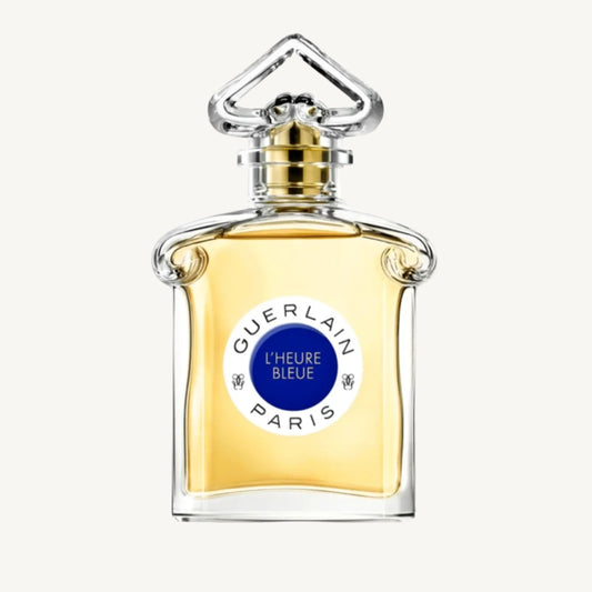 "Guerlain L'Heure Bleue 2.5 oz Eau de Toilette Spray for Women – elegant glass bottle with golden-hued fragrance, featuring the iconic inverted heart-shaped stopper, reflecting timeless sophistication."​