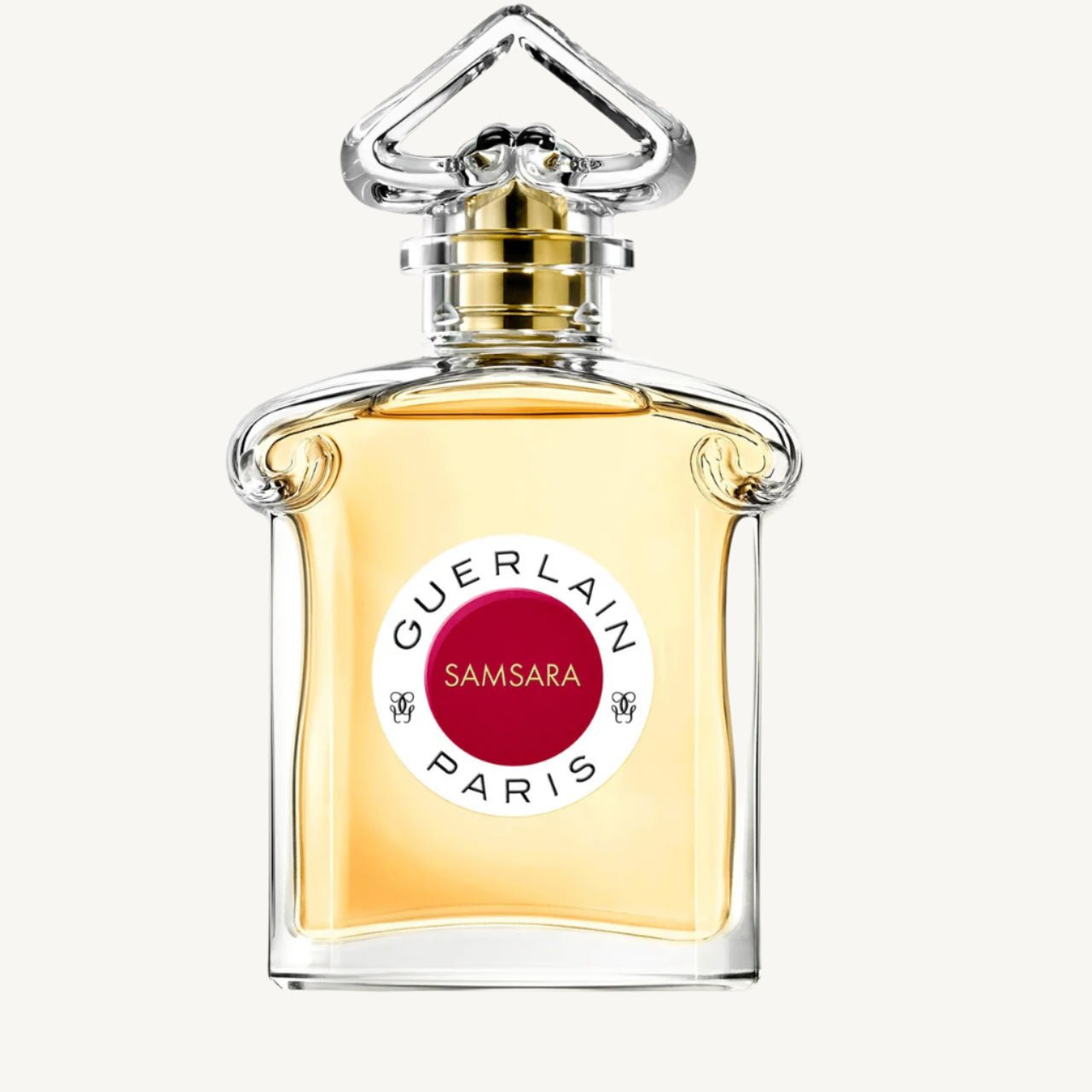 "Guerlain Samsara 2.5 oz Eau de Toilette Spray for Women – elegant ruby-red bottle with gold accents, featuring a fan-shaped cap, showcasing the iconic oriental floral fragrance."