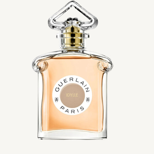 "Guerlain Idylle 2.5 oz Eau de Parfum Spray for Women – elegant teardrop-shaped glass bottle with golden-hued fragrance, reflecting the romantic floral composition."​