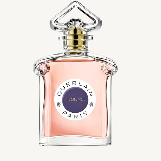 "Guerlain Insolence 2.5 oz Eau de Toilette Spray for Women – elegant glass bottle with a radiant pink hue, featuring the iconic inverted heart-shaped stopper, reflecting the vibrant and youthful fragrance."