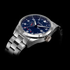 Silver watch with a blue face on a black background