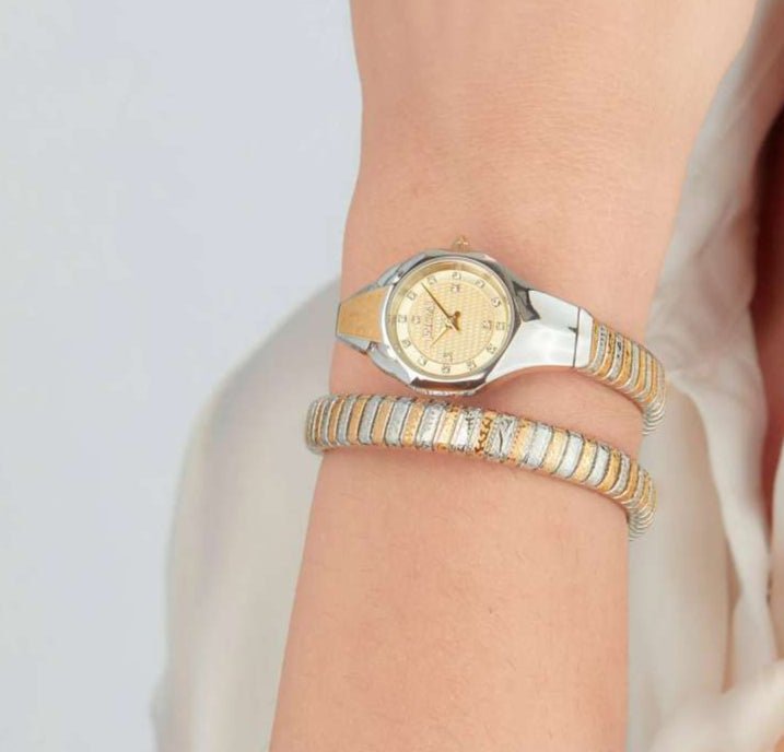 "Just Cavalli Signature Snake Amalfi ladies watch with silver and gold polished stainless steel case and bracelet, gold-tone dial with crystal details."