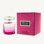 "Jimmy Choo Blossom 3.4 oz Eau de Parfum spray for women – fruity and floral fragrance in a vibrant pink bottle."