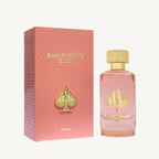 "Jo Milano Paris Game of Spades Queen 3.4 oz Parfum Spray – a luxurious pink-hued glass bottle adorned with a gold-toned cap and an embossed spade emblem, reflecting elegance and sophistication."