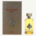 "Jo Milano Paris Game of Spades Gold 3 oz Parfum Spray – a luxurious gold-toned bottle adorned with an embossed spade emblem, reflecting elegance and sophistication."