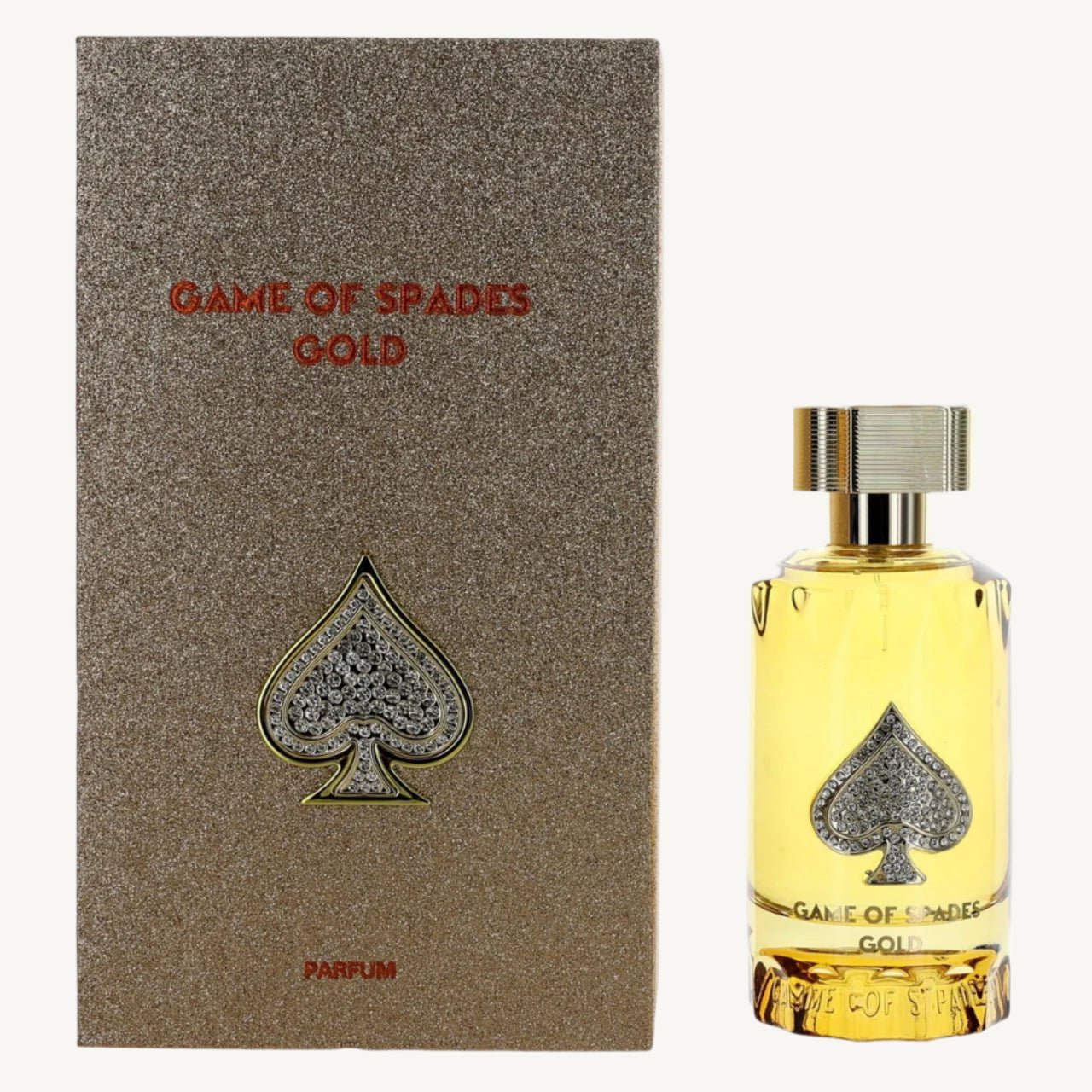 "Jo Milano Paris Game of Spades Gold 3 oz Parfum Spray – a luxurious gold-toned bottle adorned with an embossed spade emblem, reflecting elegance and sophistication."