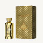 "Jo Milano Paris Game of Spades Jackpot 3.4 oz Parfum Spray – a luxurious gold-toned bottle adorned with an embossed spade emblem, reflecting elegance and sophistication."