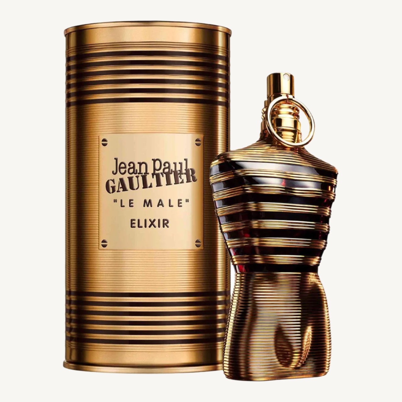 "Jean Paul Gaultier Le Male Elixir 4.2 oz Parfum spray for men – intense, warm and seductive fragrance in a bold golden-black torso bottle."