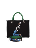Hand-painted handbag with artwork on both front and back, featuring a red cotton logoed interior with four functional pockets, nickel-colored hooks and internal zip, double green leather handle, and a matching hand-painted leather and canvas shoulder strap reflecting the theme of the main painting, secured with a magnetic button closure.