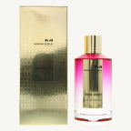 "Mancera Roses Greedy Eau de Parfum 4 oz – a luxurious glass bottle with a gold-toned cap, containing a pink-hued fragrance, reflecting elegance and sophistication."