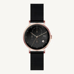 Marco Milano MH99199G1 men’s chronograph watch with polished rose gold-tone stainless steel case, black-coated bracelet, black dial, and stopwatch function – stylish Japanese quartz timepiece.