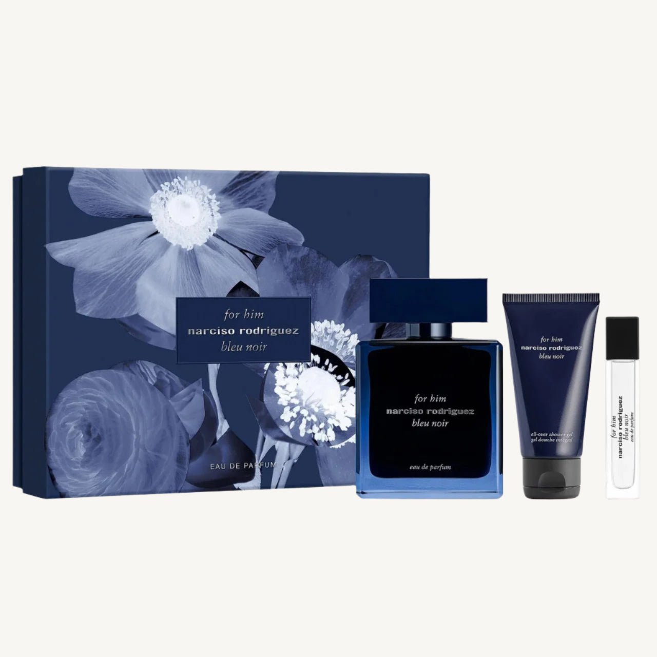 "Narciso Rodriguez For Him Bleu Noir 3-Piece Set featuring a 3.3 oz Eau de Parfum bottle, a 0.33 oz travel-size spray, and a 1.6 oz shower gel, all presented in a sleek navy gift box."