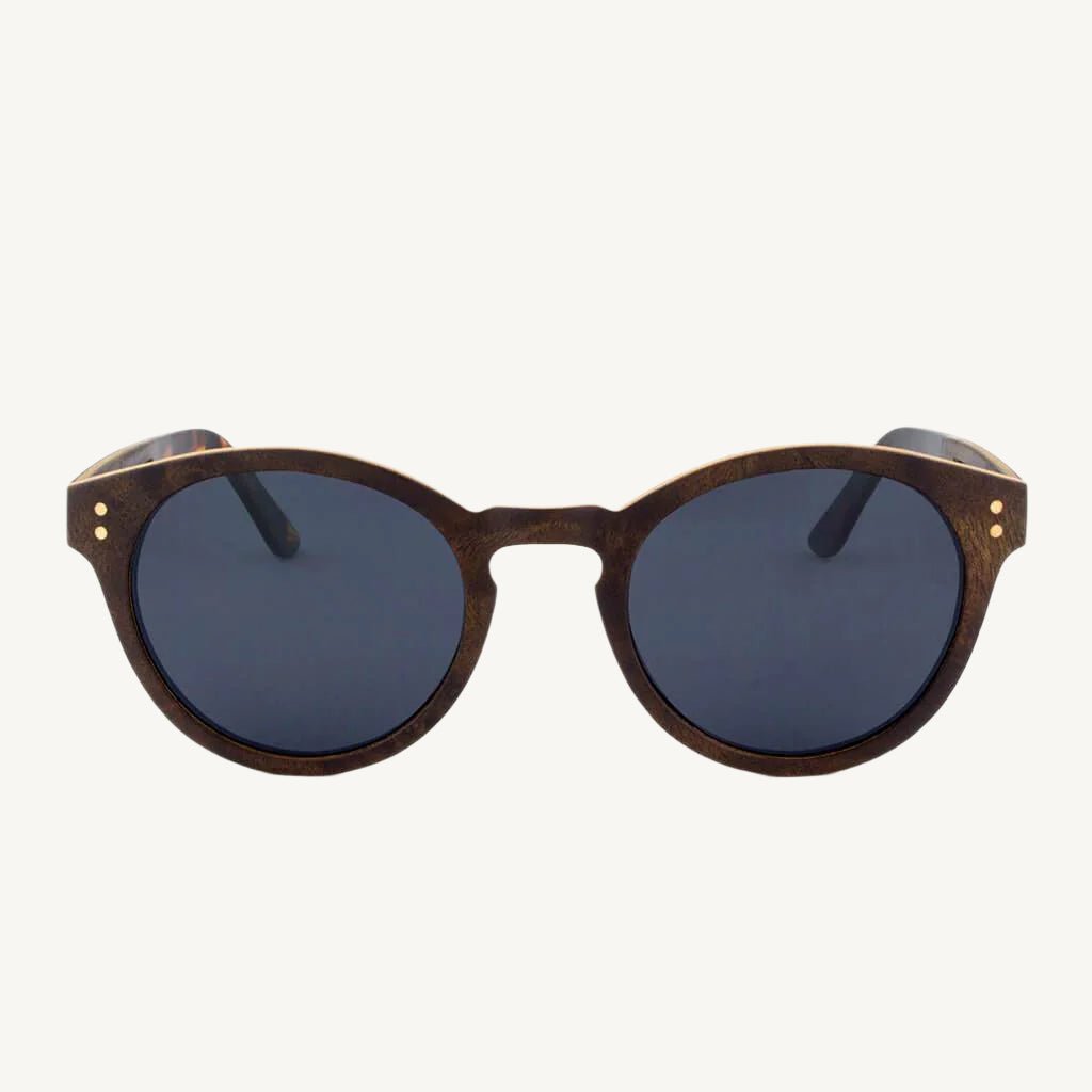Nassau wood sunglasses — crafted from natural wood, offering a stylish, lightweight, and eco-friendly design. Ideal for a bold and earthy look with a modern twist.