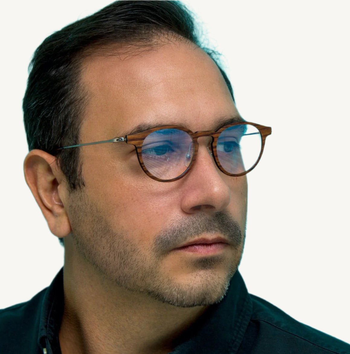 Marion featherlight titanium and wood eyeglasses — modern and stylish, featuring a unique blend of natural wood accents and ultra-light titanium frames. Perfect for comfort and elegance.