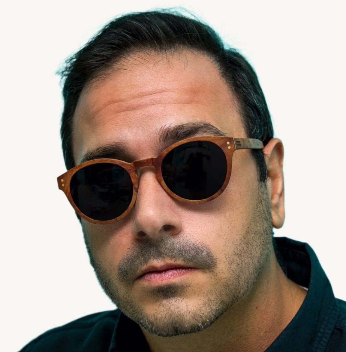 Nassau wood sunglasses — crafted from natural wood, offering a stylish, lightweight, and eco-friendly design. Ideal for a bold and earthy look with a modern twist.