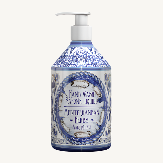Hand wash bottle with decorative blue and white design on a white background