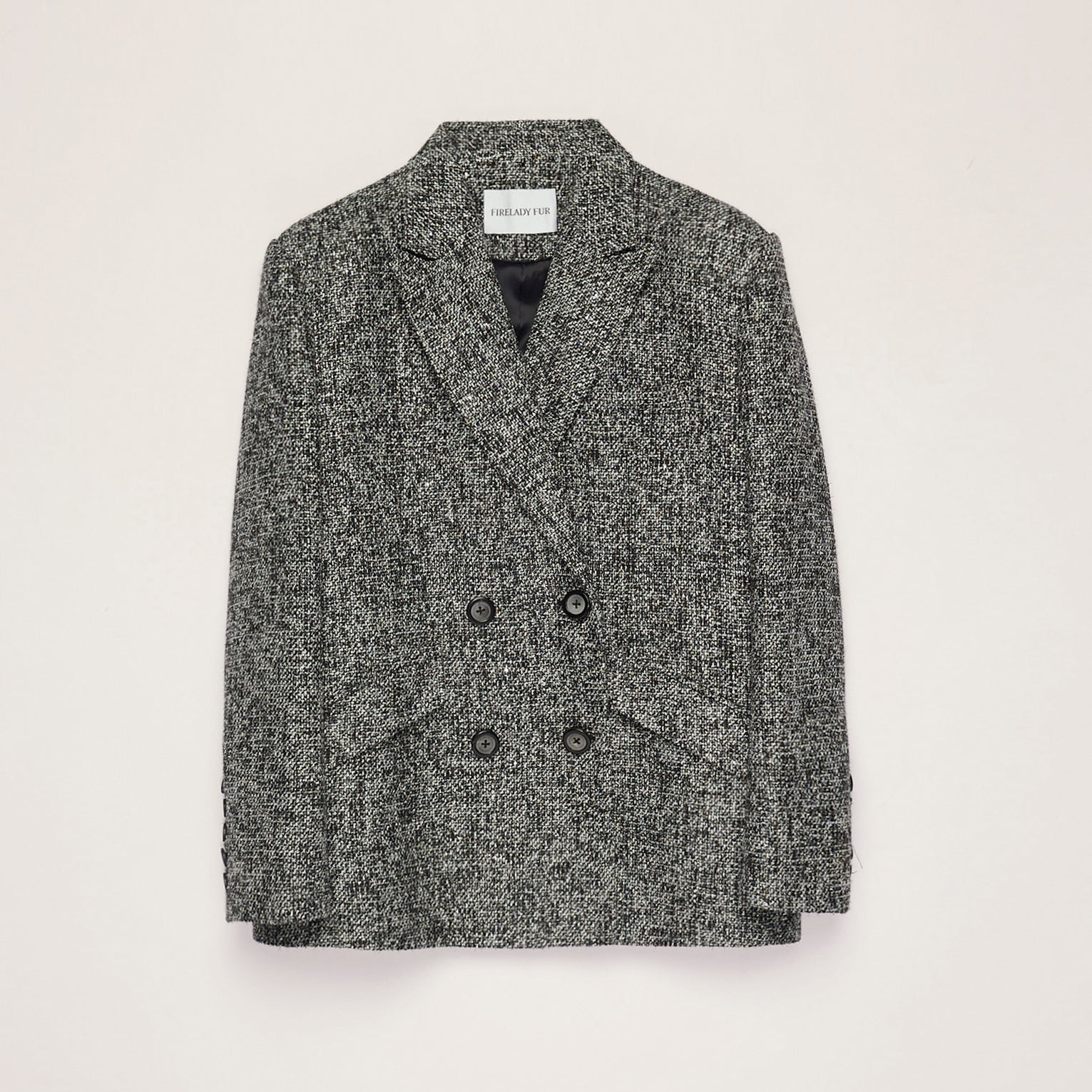 Gray textured blazer on a light beige background