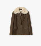 Brown coat with beige fur collar on a white background