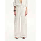 White outfit with wide-leg pants on a white background