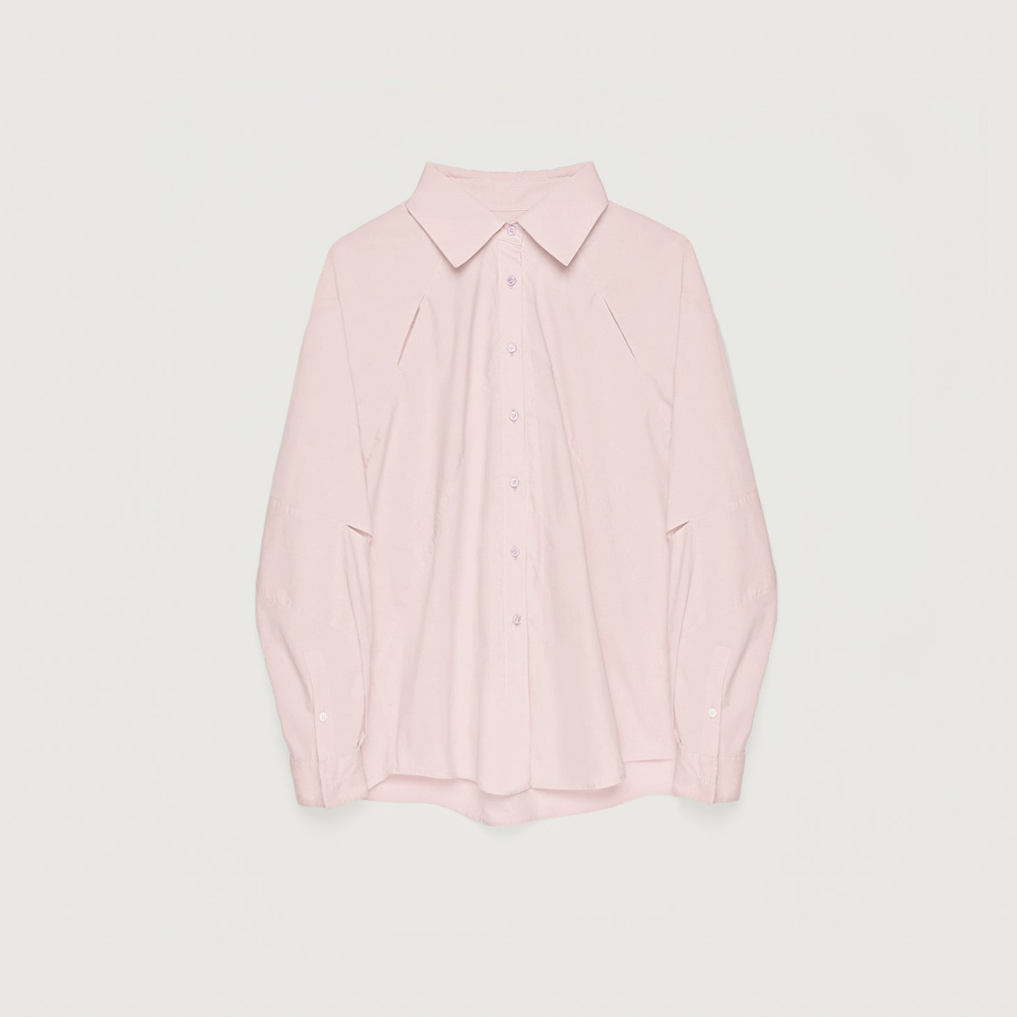 Pink shirt on a light gray background