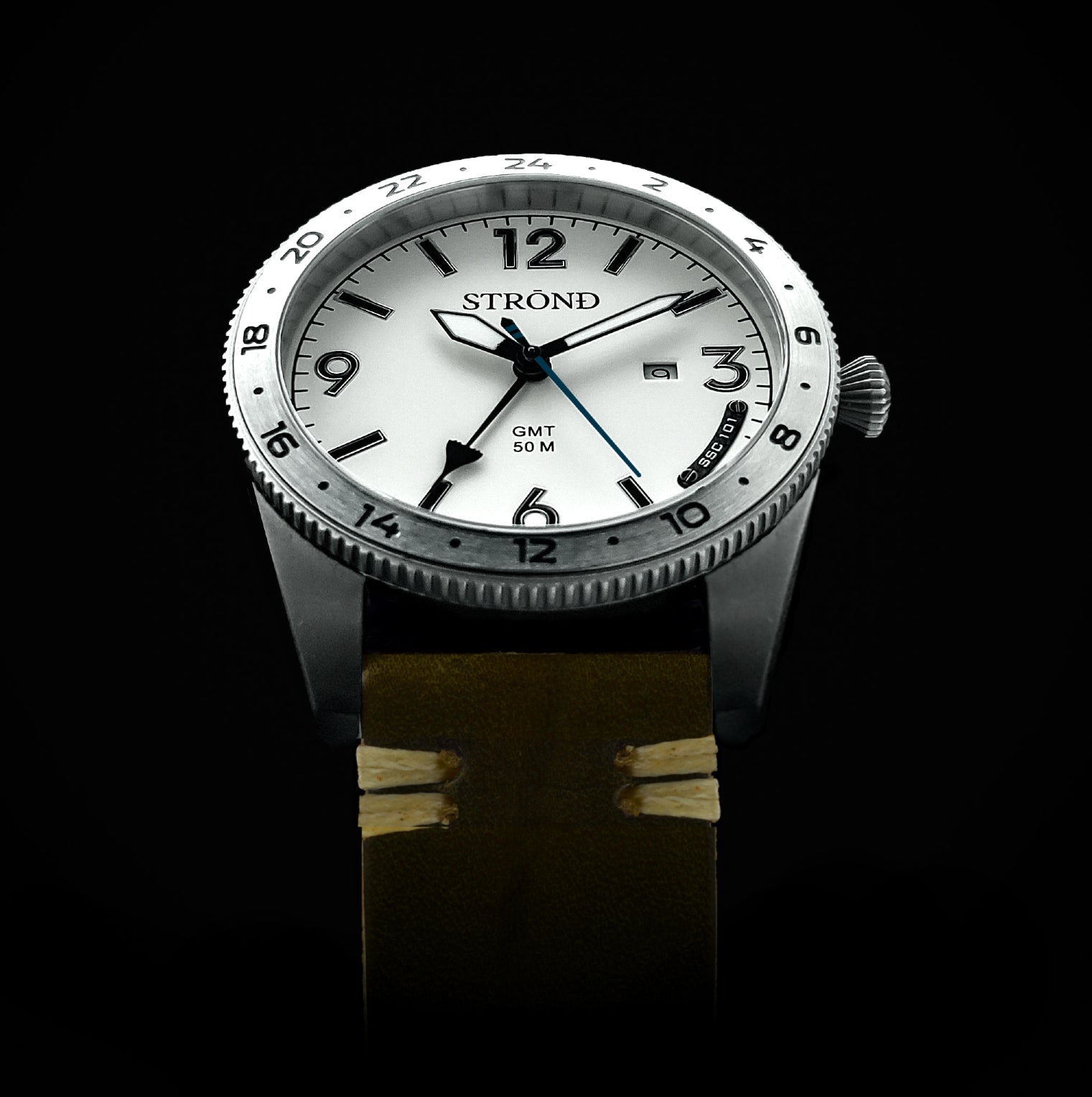 Silver watch with white face on a black background