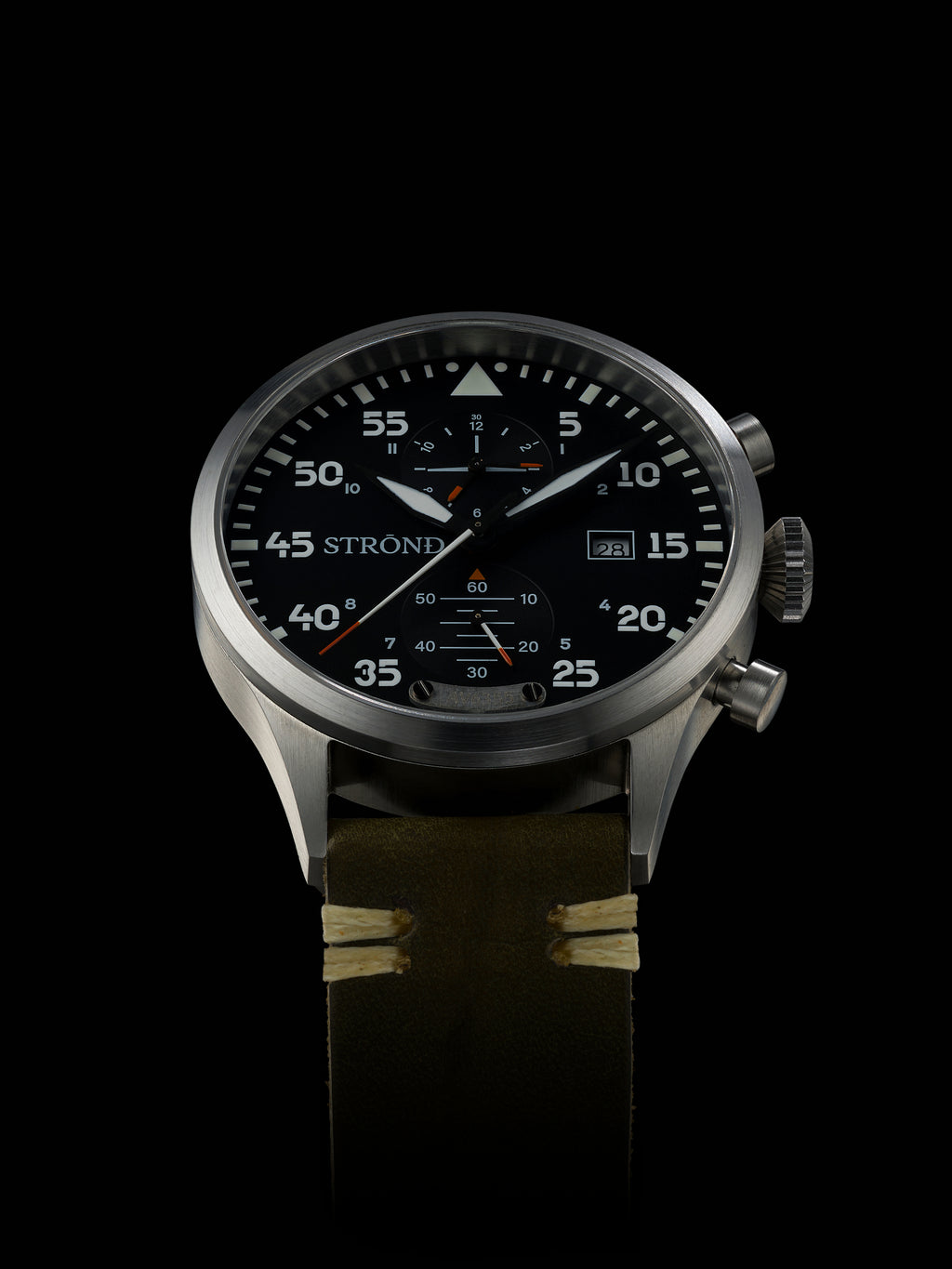 Wristwatch with detailed face on a black background