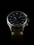 Wristwatch with detailed face on a black background