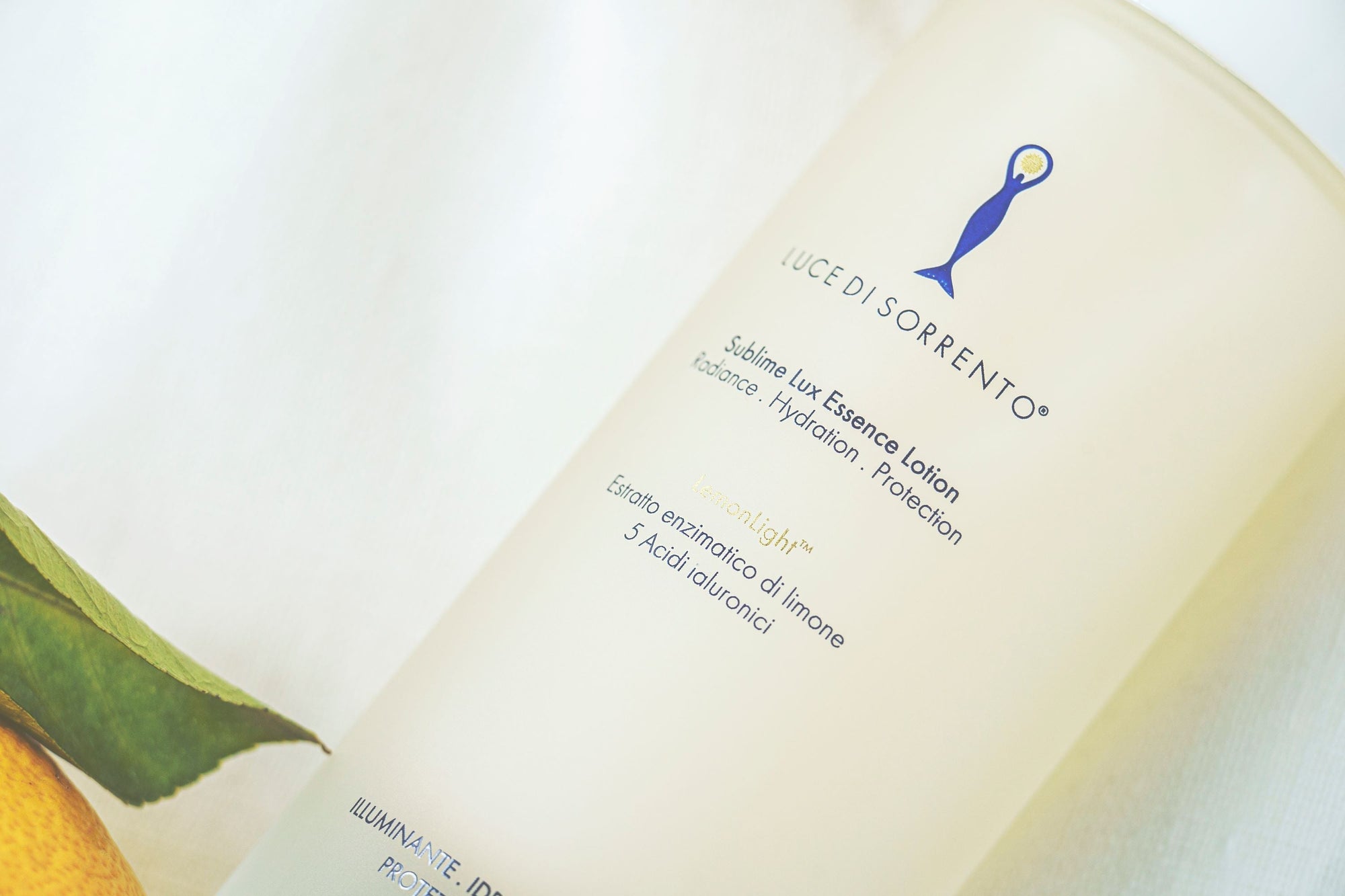 "Luce di Sorrento Sublime Lux Essence Face Lotion 100ml – concentrated brightening essence with LemonLight® enzymatic lemon extract, 5 types of hyaluronic acid, vitamin C, and probiotics, designed to hydrate, illuminate, and strengthen the skin barrier."