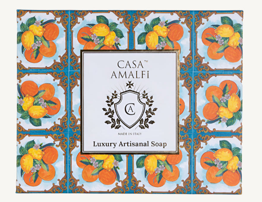 "Casa Amalfi Summer in Sorrento Gift Box featuring a 150g vegan orange, lemon & spices soap and a hand-painted ceramic soap dish from Vietri Sul Mare, inspired by the Amalfi Coast and presented in a glossy maiolica design."