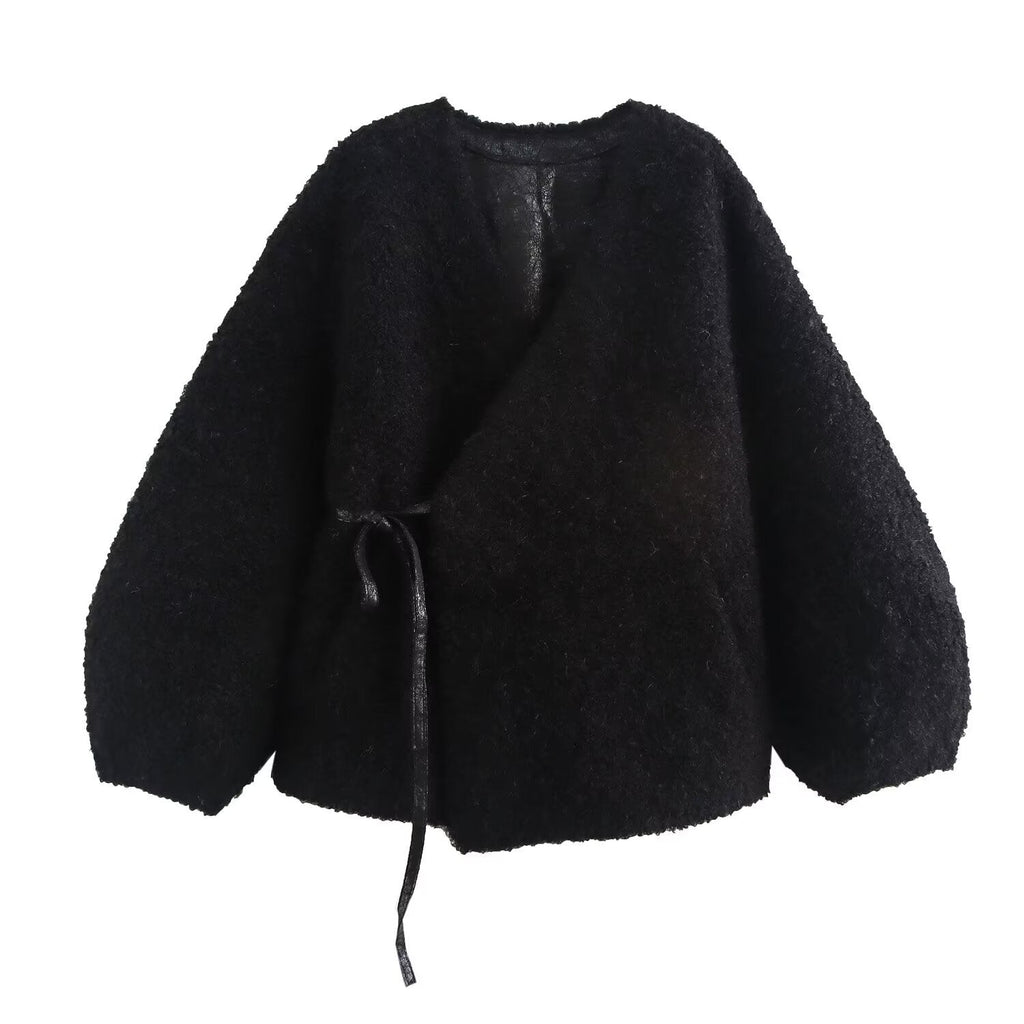 Black textured jacket on a white background