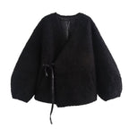 Black textured jacket on a white background