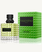 "Valentino Donna Born in Roma Green Stravaganza 3.4 oz Eau de Parfum Spray – a bold and luminous floral-green fragrance for women with notes of jasmine, Lapsang Souchong tea, and ambrette, in a vibrant green studded bottle."