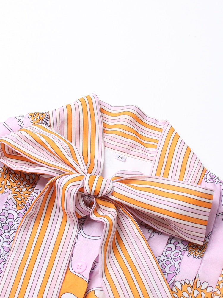 Striped fabric with a knot on a white background