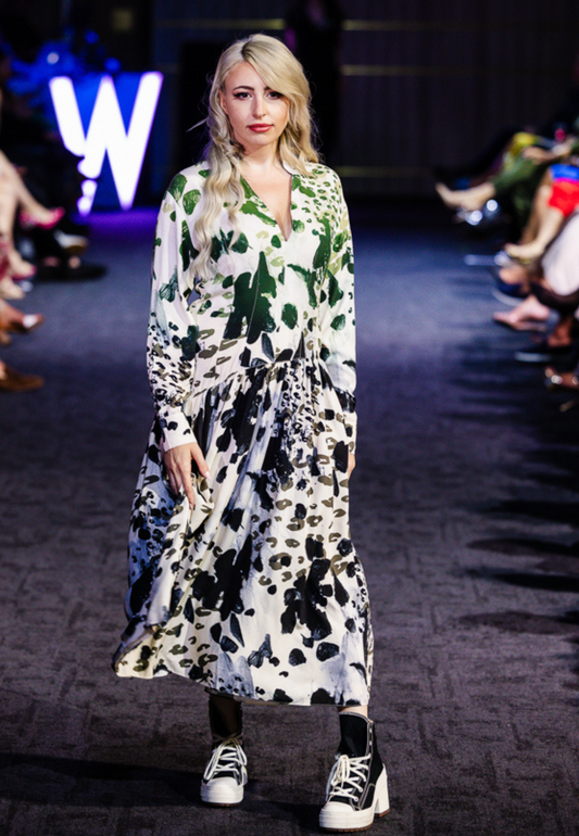 "Agnese Leopard Maxi Dress with ombré leopard print, Split V-neckline, waist-accentuating draping, and buttoned cuffs, crafted in Italy from natural viscose."