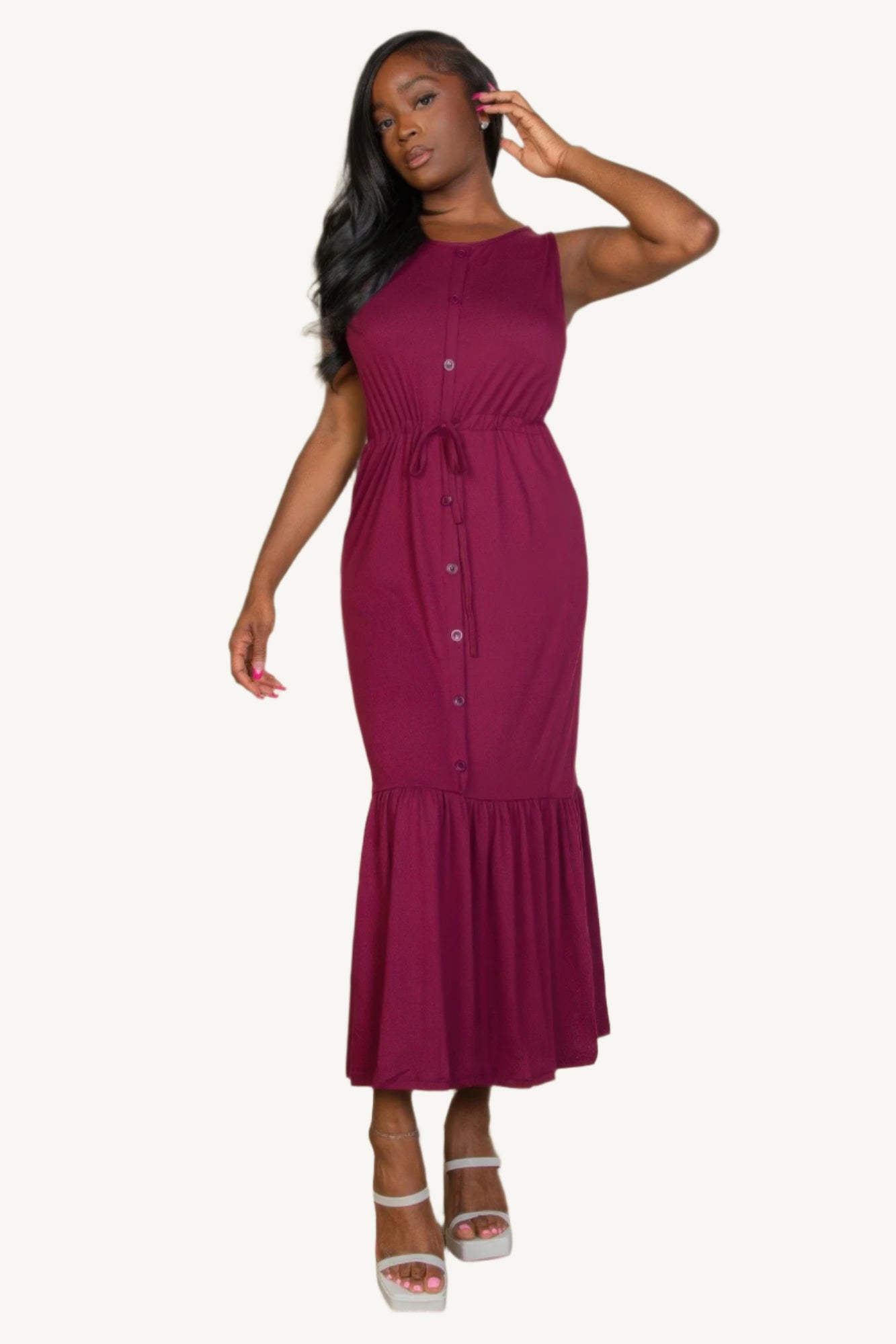 "Sleeveless jersey maxi dress with button front and tie waist – lightweight, stretchy fabric for a flattering, relaxed summer look."